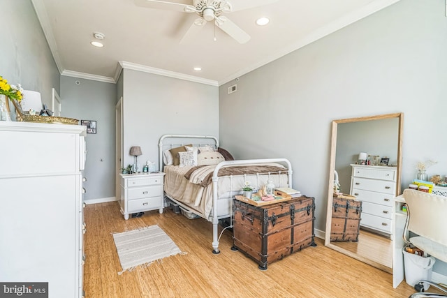 bedroom with crown molding, light wood-style floors, recessed lighting, baseboards, and visible vents