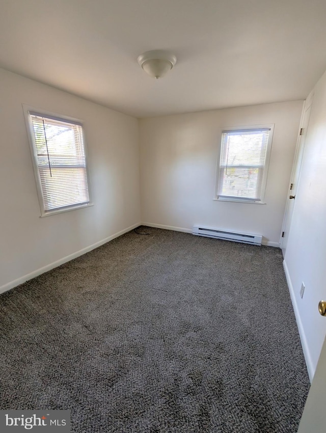 405 Poplar St, Salisbury, MD 21804 - carpeted spare room with baseboards and baseboard heating