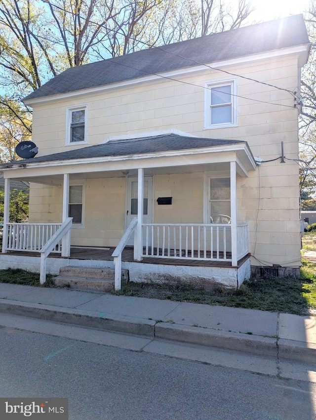 405 Poplar St, Salisbury, MD 21804 - country-style home with covered porch and roof with shingles