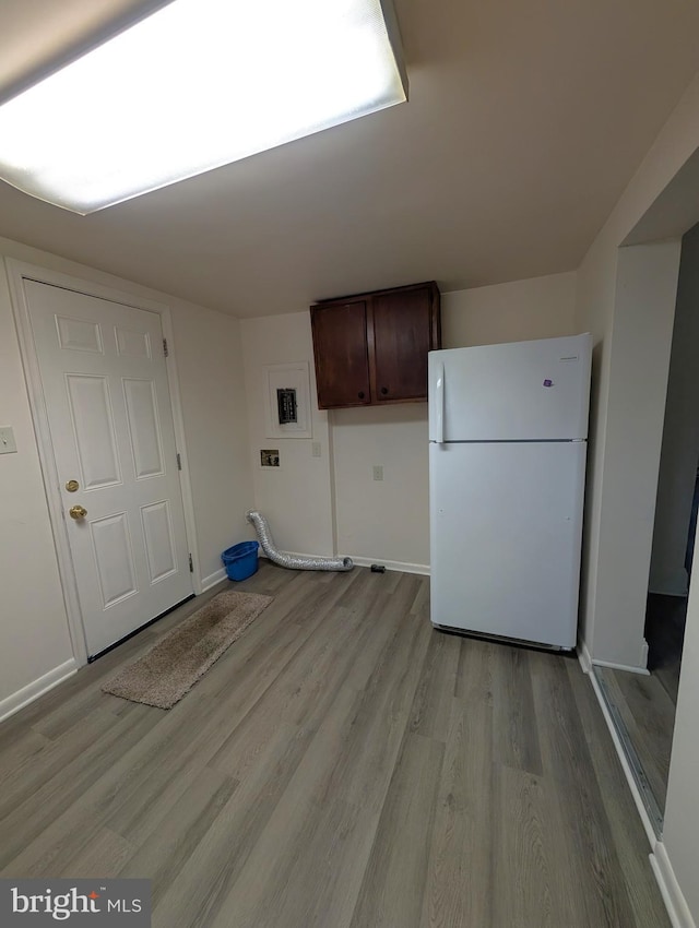 405 Poplar St, Salisbury, MD 21804 - laundry area featuring light wood finished floors and baseboards