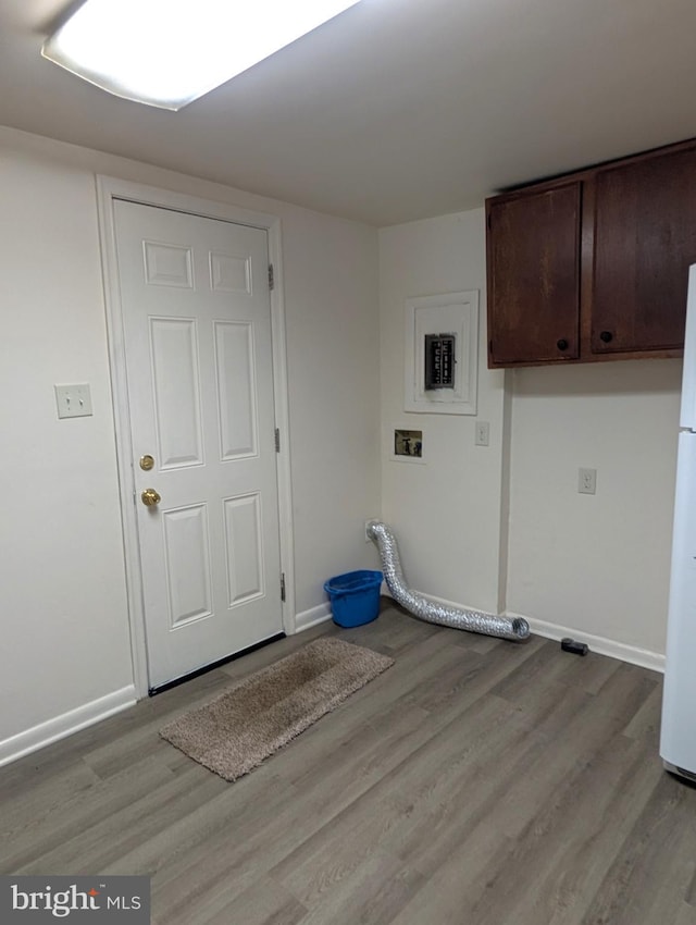405 Poplar St, Salisbury, MD 21804 - washroom with cabinet space, light wood-style floors, baseboards, and hookup for a washing machine