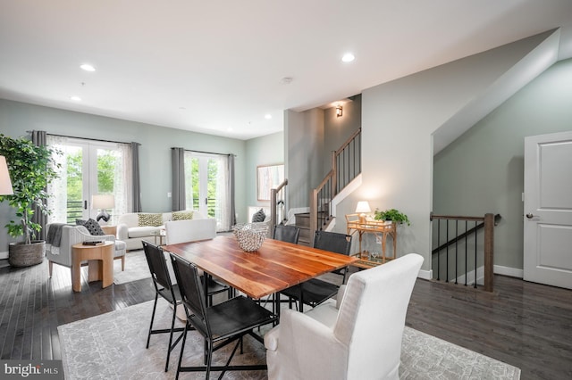 dining area featuring recessed lighting, stairs, and wood finished floors