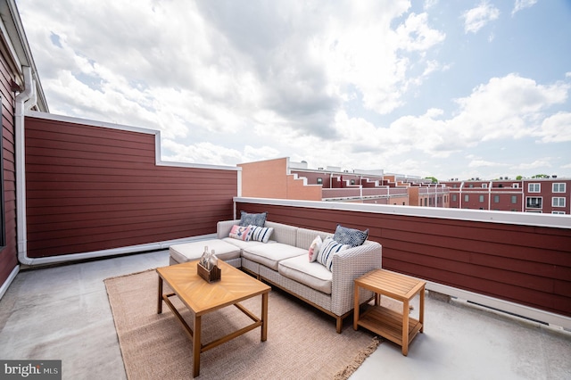 view of patio with outdoor lounge area and a balcony
