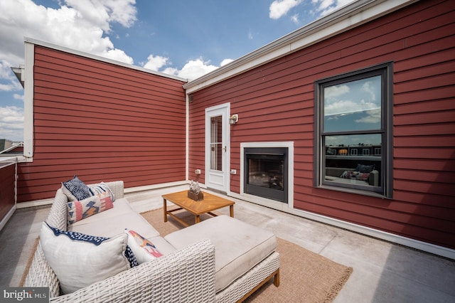 exterior space featuring an outdoor hangout area