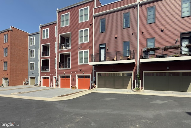 view of building exterior featuring an attached garage