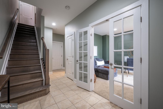 interior space featuring tile patterned floors and french doors