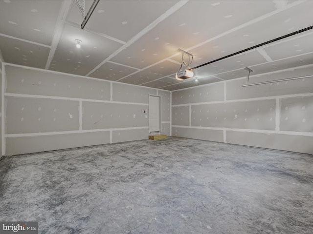 garage featuring a garage door opener