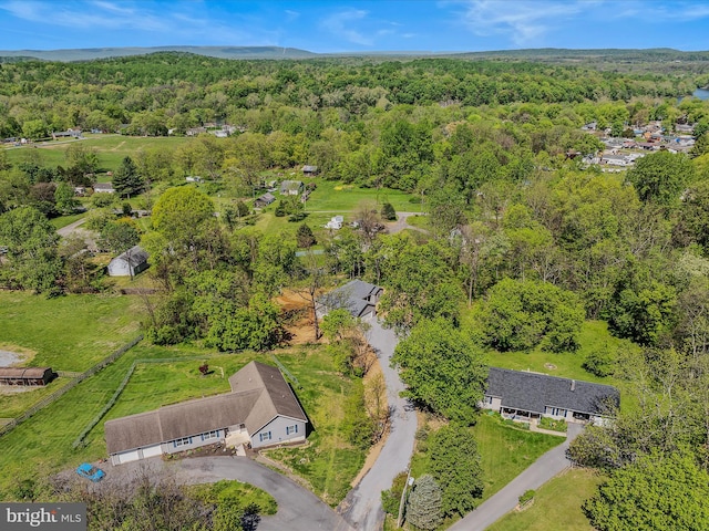 aerial view featuring a forest view