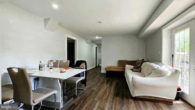 dining room with dark wood-type flooring, recessed lighting, and baseboards