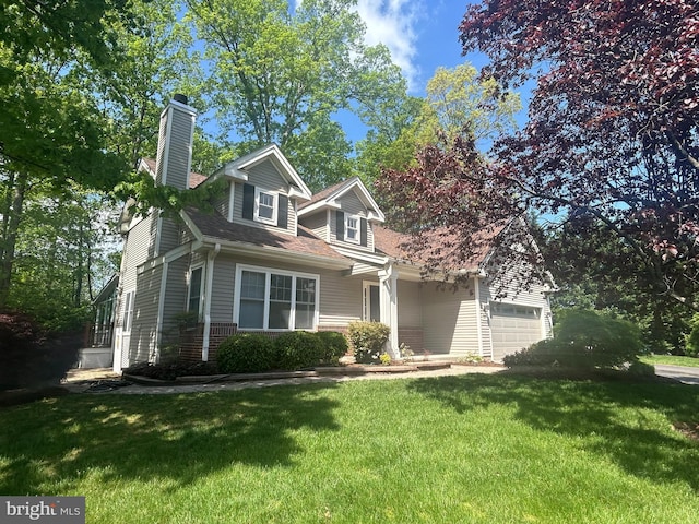 11801 Pond Crest Ct, New Market, MD 21774 - view of front of home featuring a chimney, a front yard, an attached garage, and a shingled roof