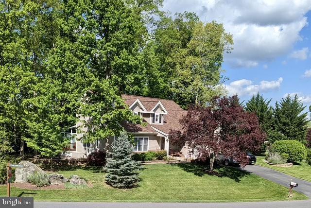 11801 Pond Crest Ct, New Market, MD 21774 - view of property hidden behind natural elements featuring a front yard
