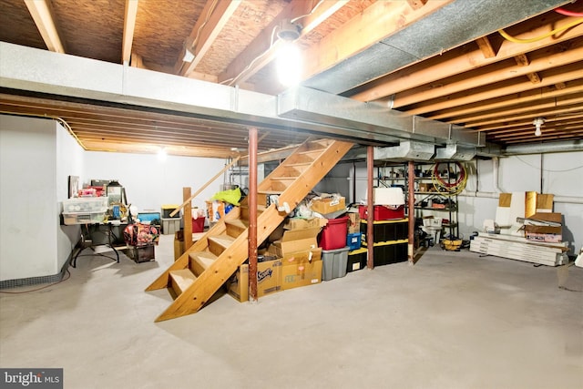 unfinished basement with stairway