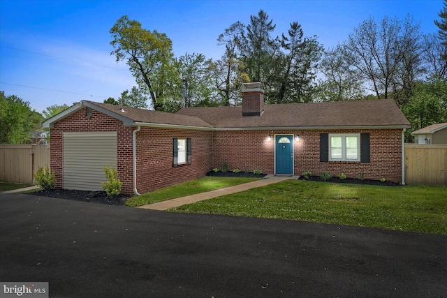 2304 Milltown Rd, Wilmington, DE 19808 - ranch-style house featuring fence, a chimney, and brick siding