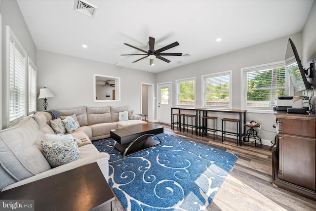 2304 Milltown Rd, Wilmington, DE 19808 - living room featuring ceiling fan, visible vents, a wealth of natural light, and wood finished floors