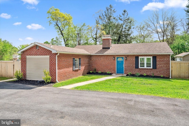 2304 Milltown Rd, Wilmington, DE 19808 - ranch-style house featuring a front lawn, fence, roof with shingles, a chimney, and brick siding