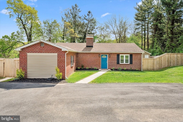 2304 Milltown Rd, Wilmington, DE 19808 - single story home with brick siding, fence, and a front yard