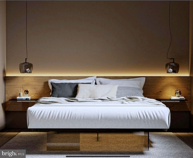 bedroom featuring wood walls