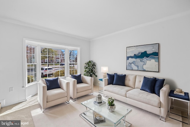 living area featuring crown molding, baseboards, and light carpet