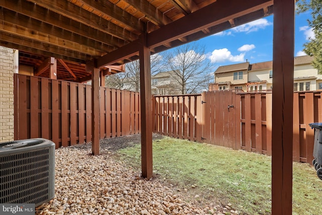 view of yard featuring a fenced backyard and cooling unit