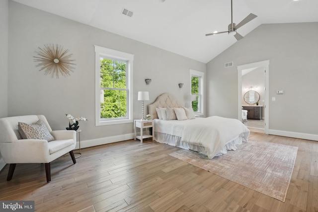 bedroom with visible vents, light wood-style floors, and baseboards