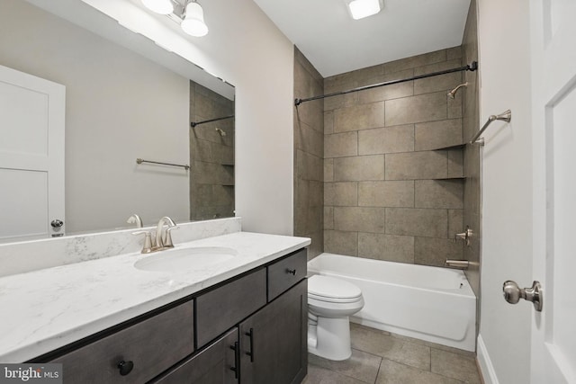 full bathroom featuring shower / bathing tub combination, tile patterned flooring, vanity, baseboards, and toilet