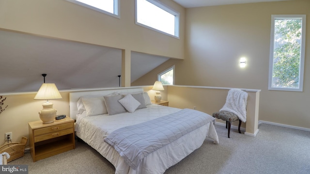 carpeted bedroom with baseboards