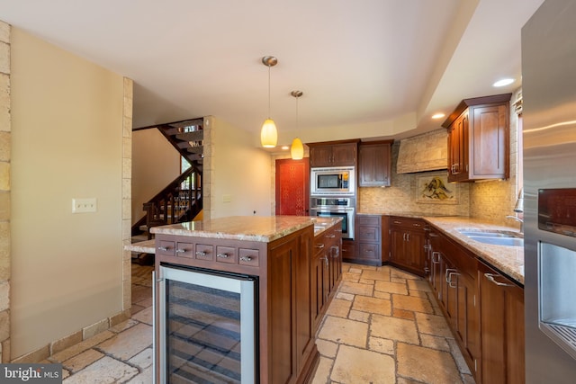 kitchen featuring wine cooler, decorative backsplash, stainless steel appliances, and stone tile flooring