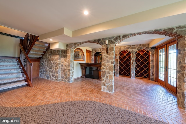 interior space featuring brick floor