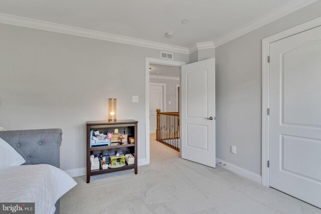 bedroom featuring visible vents, ornamental molding, baseboards, and carpet floors