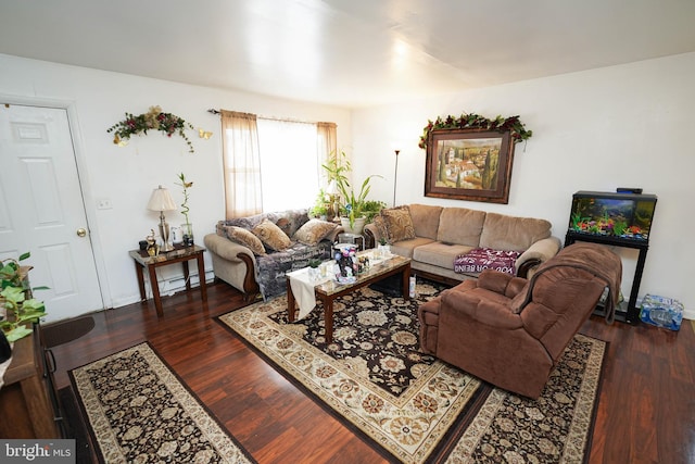 435 N St, Milford, DE 19963 - living room featuring a baseboard heating unit and wood finished floors
