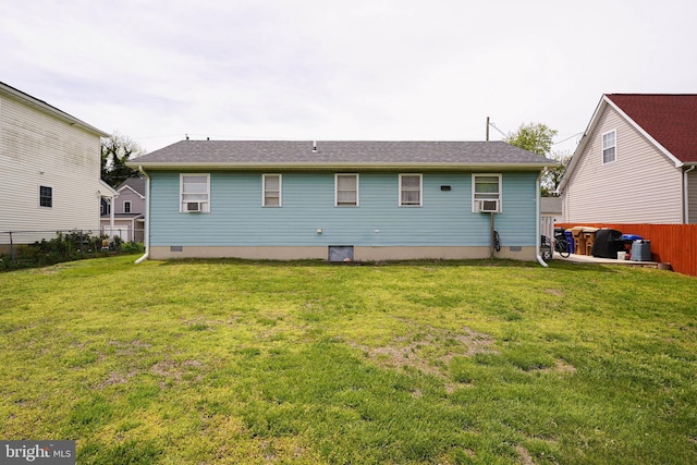435 N St, Milford, DE 19963 - back of property with a fenced backyard, a yard, crawl space, and cooling unit