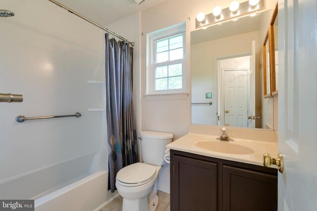 13830 Lord Fairfax Pl, Upper Marlboro, MD 20772 - bathroom with toilet, vanity, shower / bathtub combination with curtain, and tile patterned flooring