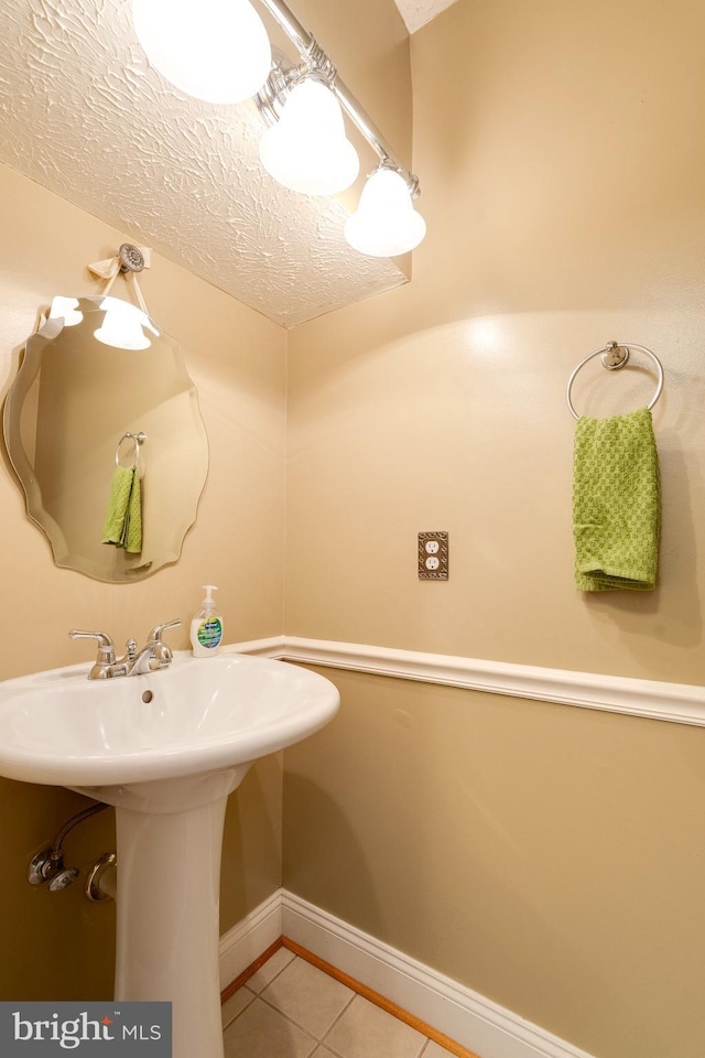 13830 Lord Fairfax Pl, Upper Marlboro, MD 20772 - bathroom with tile patterned floors, baseboards, and a textured ceiling