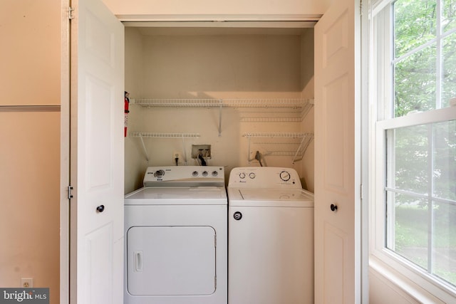 13830 Lord Fairfax Pl, Upper Marlboro, MD 20772 - clothes washing area featuring washing machine and clothes dryer