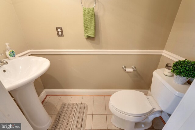 13830 Lord Fairfax Pl, Upper Marlboro, MD 20772 - bathroom with tile patterned flooring, toilet, and baseboards