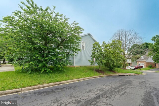 13830 Lord Fairfax Pl, Upper Marlboro, MD 20772 - view of property exterior with a lawn