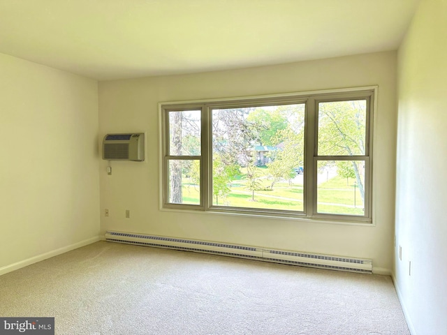 empty room featuring plenty of natural light, carpet, a wall mounted AC, and a baseboard heating unit