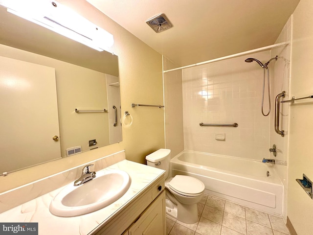 full bathroom featuring visible vents, vanity, toilet, bathtub / shower combination, and tile patterned floors