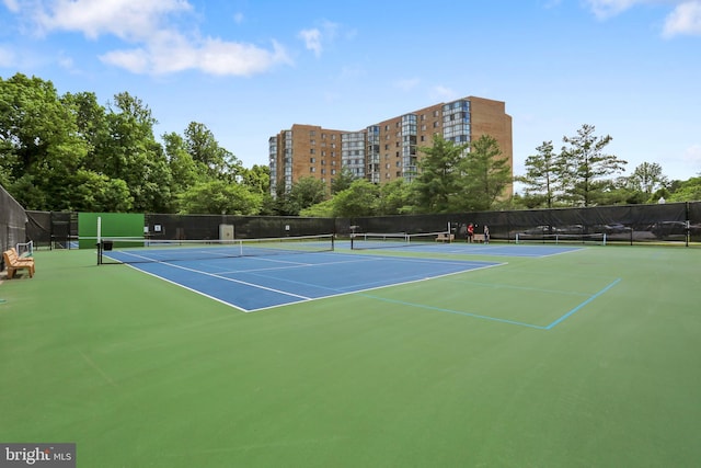 view of sport court with community basketball court and fence