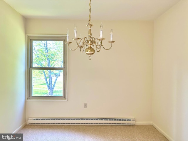 spare room featuring baseboards, carpet flooring, a baseboard heating unit, and a chandelier