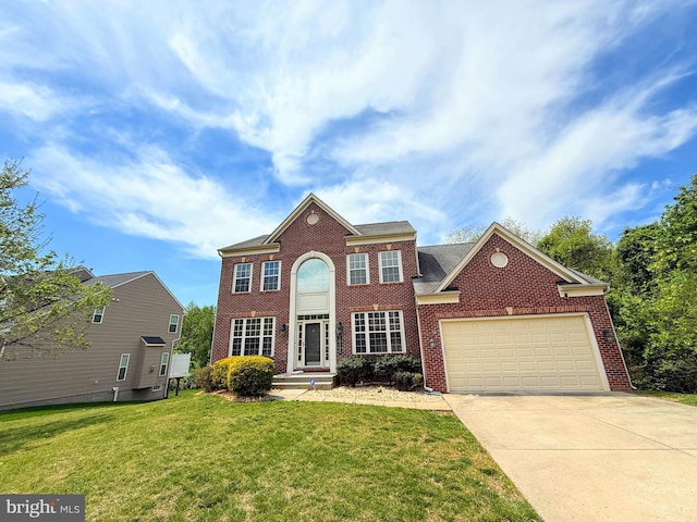 12405 Hillantrae Dr, Clinton, MD 20735 - view of front of house featuring brick siding, an attached garage, concrete driveway, and a front yard