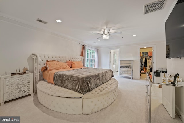 12405 Hillantrae Dr, Clinton, MD 20735 - bedroom with crown molding, a spacious closet, recessed lighting, light colored carpet, and a closet