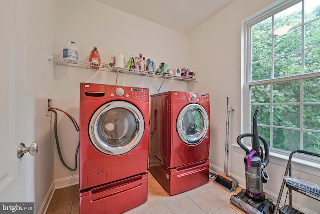 12405 Hillantrae Dr, Clinton, MD 20735 - washroom with independent washer and dryer, healthy amount of natural light, baseboards, and tile patterned flooring