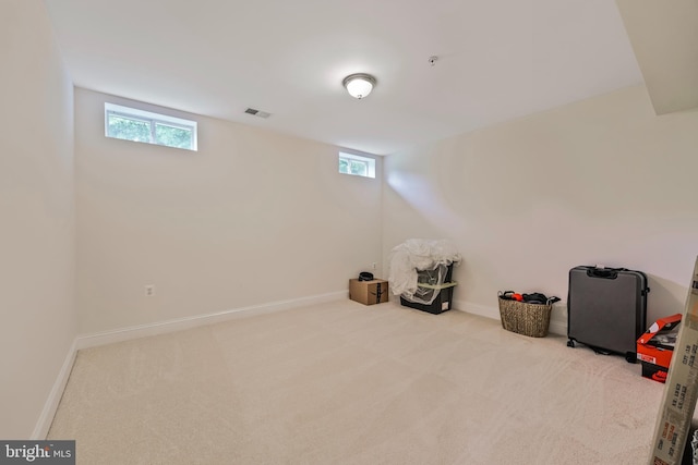 12405 Hillantrae Dr, Clinton, MD 20735 - basement featuring plenty of natural light, carpet, and baseboards