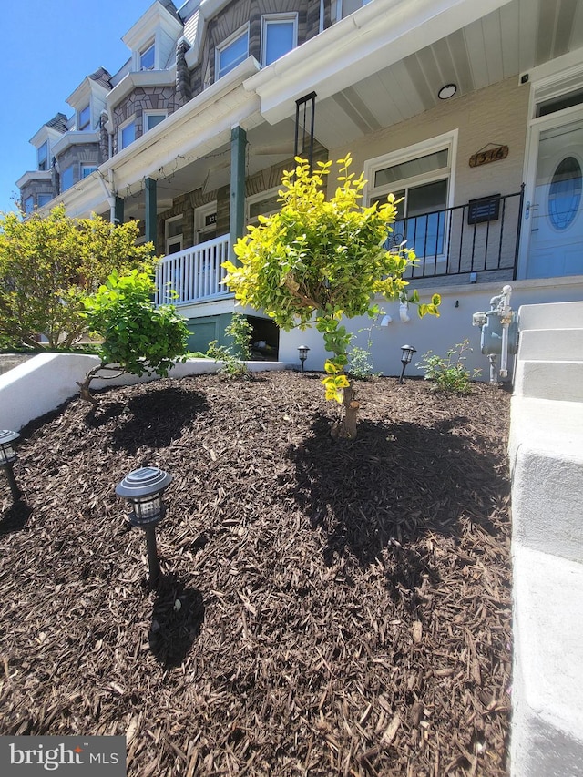 exterior space featuring covered porch