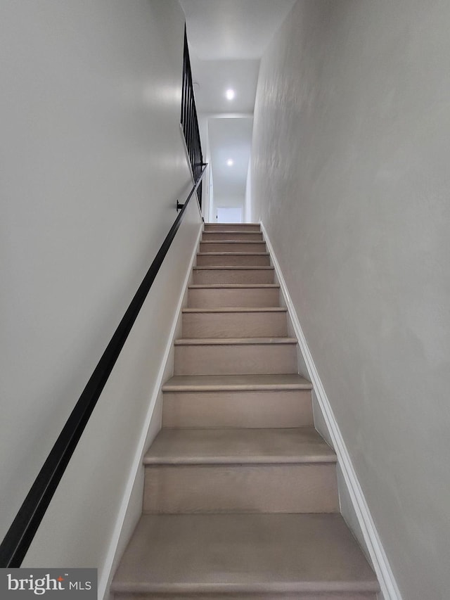 stairs with recessed lighting