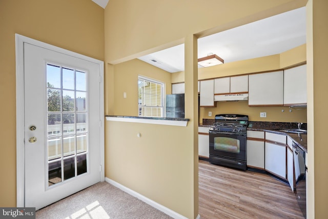 230 Mill Run Ct, Hightstown, NJ 08520 - kitchen with a sink, white cabinets, black appliances, and under cabinet range hood