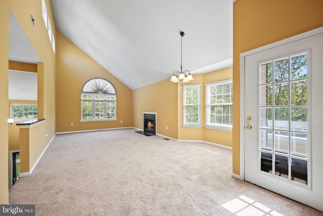 230 Mill Run Ct, Hightstown, NJ 08520 - unfurnished living room featuring carpet floors, visible vents, an inviting chandelier, baseboards, and a fireplace with flush hearth