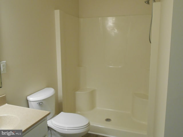 6271 Solomons Cir, Hurlock, MD 21643 - bathroom featuring vanity, a shower, and toilet