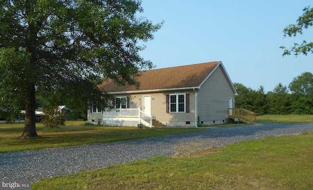 6271 Solomons Cir, Hurlock, MD 21643 - ranch-style house featuring crawl space, a front yard, and gravel driveway
